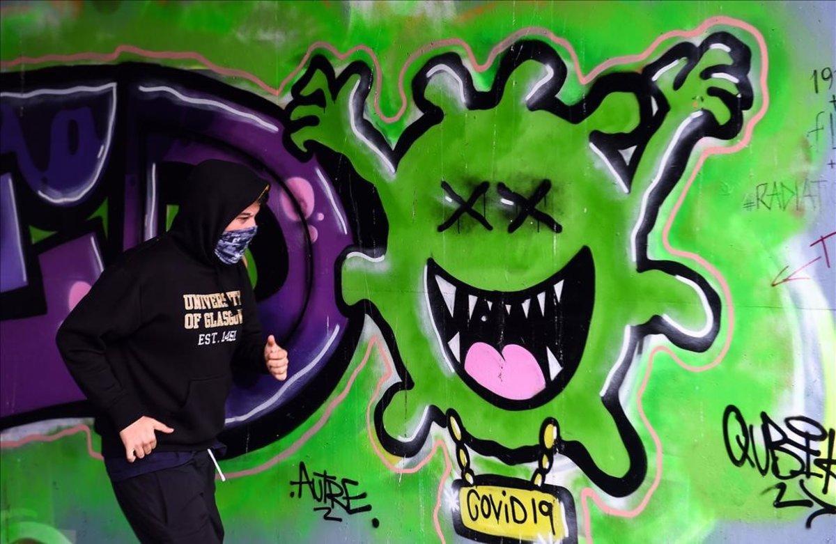 coronavirus. Mural en Glasgow