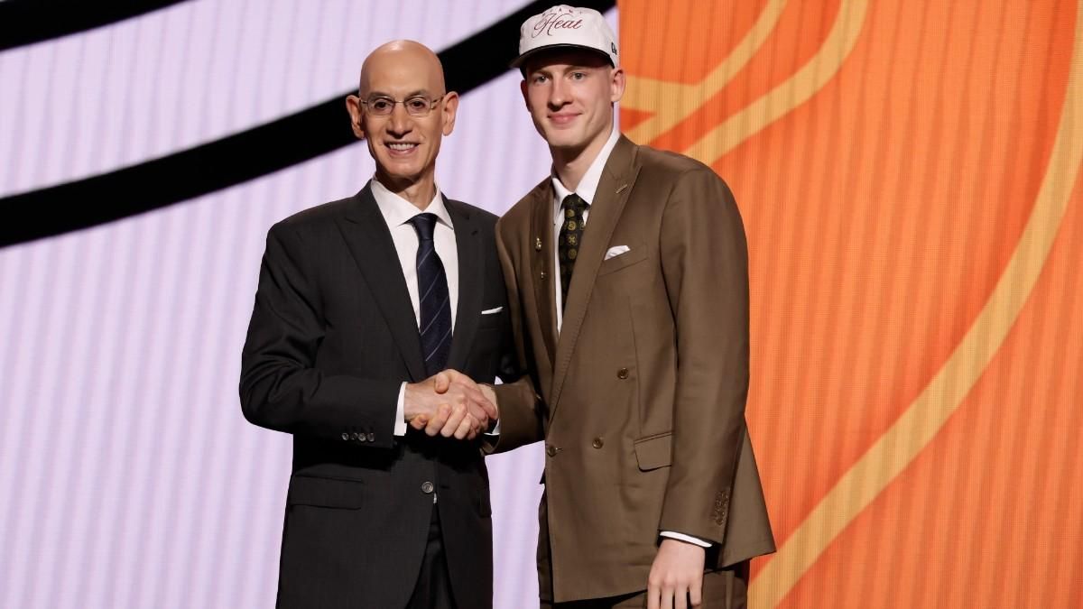 Kasparas Jakucionis, together with the NBA Commissioner, Adam Silver
