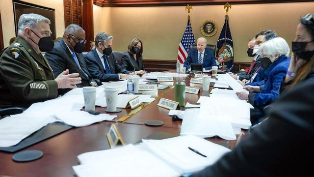 In this photo released by the White House, US President Joe Biden (C) meets with the National Security Council on the Ukraine-Russia crisis, in the situation Room of the White House in Washington, DC, on February 24, 2022. - Present at the meeting are (L-R) Chairman of the Joint Chiefs of Staff General Mark Milley, Defense Secretary Lloyd Austin, Secretary of State Antony Blinken, Vice President Kamala Harris, President Biden, National Security Adviser Jake Sullivan, White House Chief of Staff Ron Klain, Treasury Secretary Janet Yellen, and Director of National Intelligence Avril Haines. (Photo by The White House / AFP) / RESTRICTED TO EDITORIAL USE - MANDATORY CREDIT "AFP PHOTO / The White House" - NO MARKETING NO ADVERTISING CAMPAIGNS - DISTRIBUTED AS A SERVICE TO CLIENTS