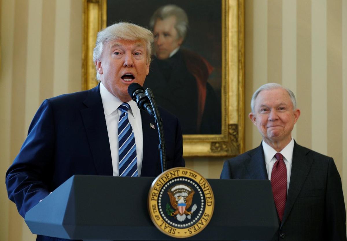 FILE PHOTO  U S  President Donald Trump speaks during a swearing-in ceremony for new Attorney General Jeff Sessions  R   at the White House in Washington  U S   February 9  2017  REUTERS Kevin Lamarque File Photo