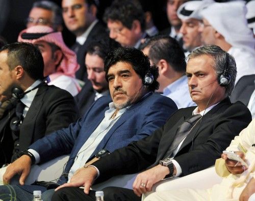 Argentine former soccer star Maradona and Real Madrid's coach Mourinho attend the final session of the first day during the Dubai International Sports Conference