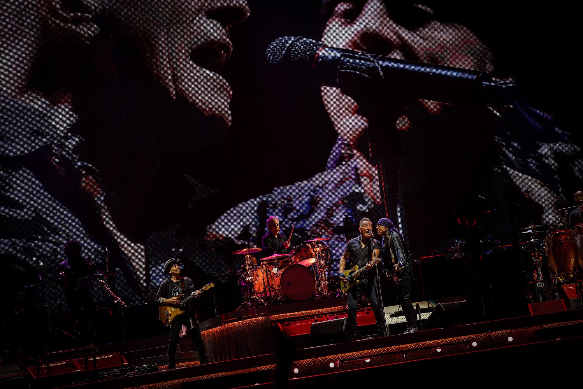 Bruce Springsteen sings in front of a giant screen during the concert at the Olympic Stadium in Barcelona