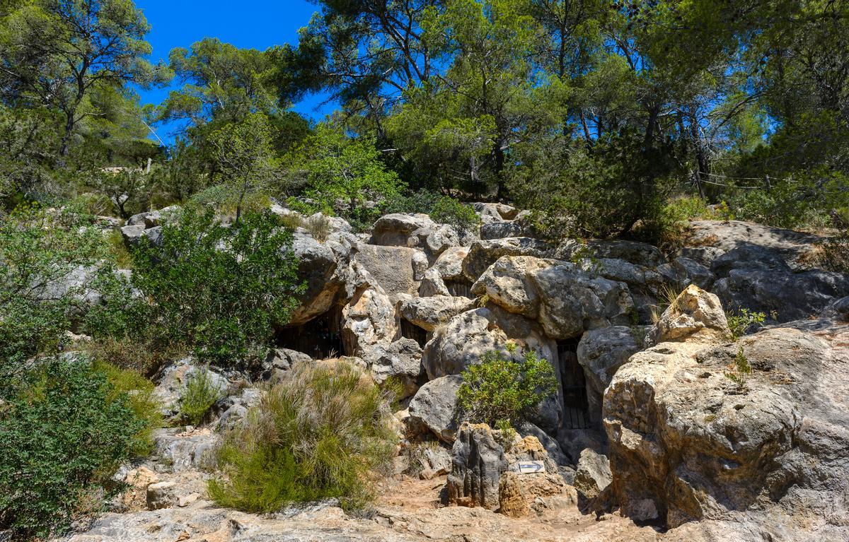 Es Culleram cave is nestled within the rugged landscape of the Serra de sa Mala Costa.