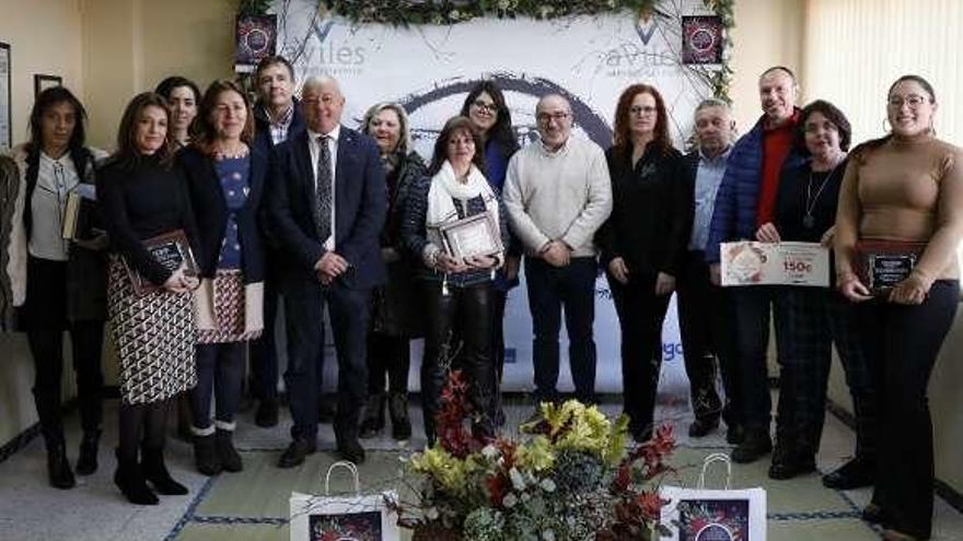 Los premiados, ayer, en la sede de la Unión de Comerciantes de Avilés y Comarca.