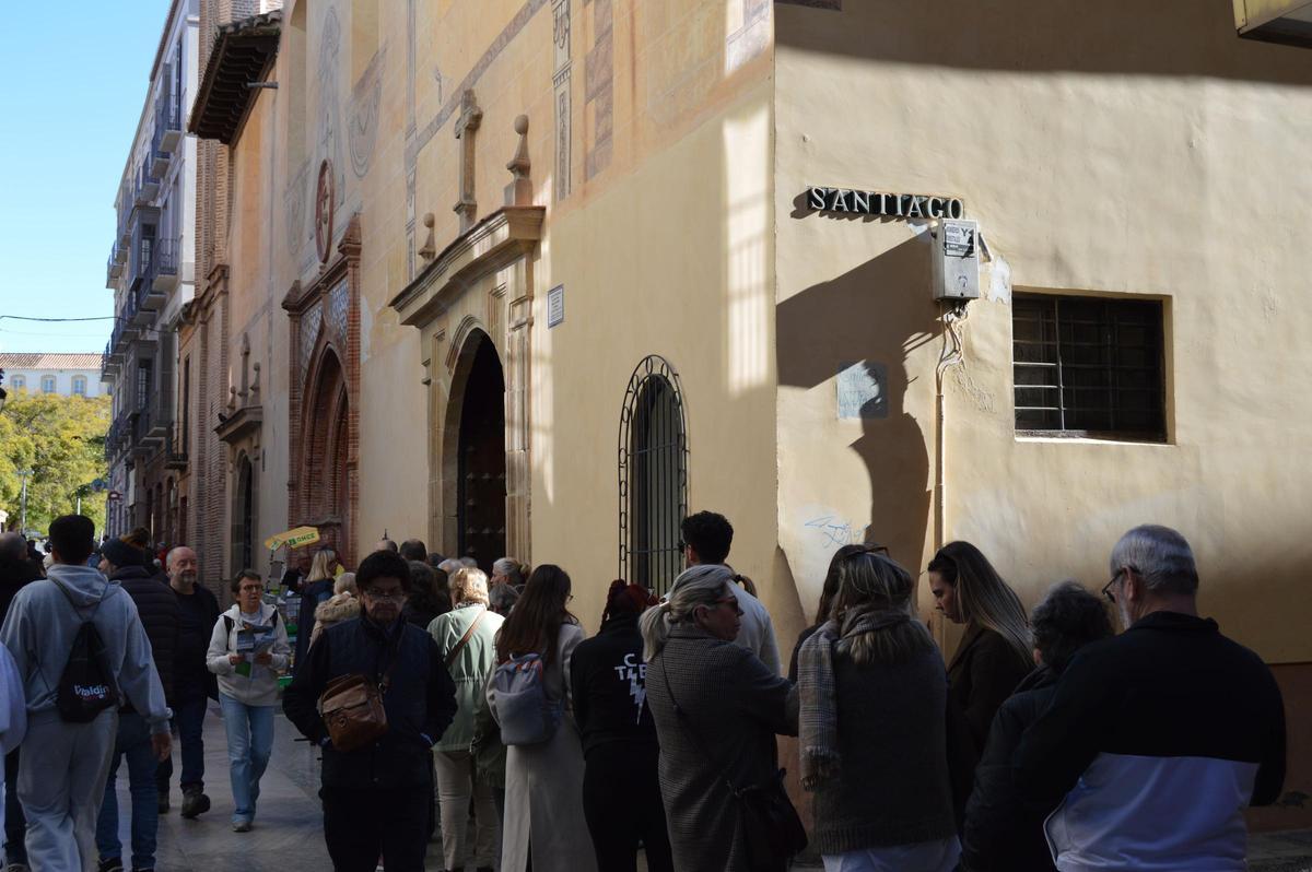 "Siempre se cumple uno": la fe de las tres monedas en el Cristo de Medinaceli