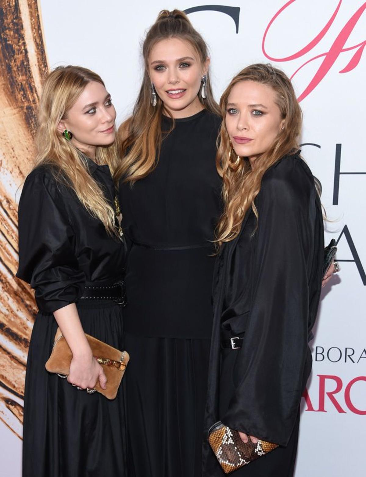 Ashley, Elizabeth y Mary Kate Olsen en los CFDA Fashion Awards