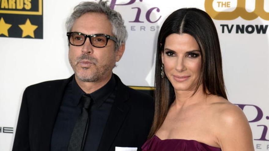 Sandra Bullock con Alfonso Cuarón.