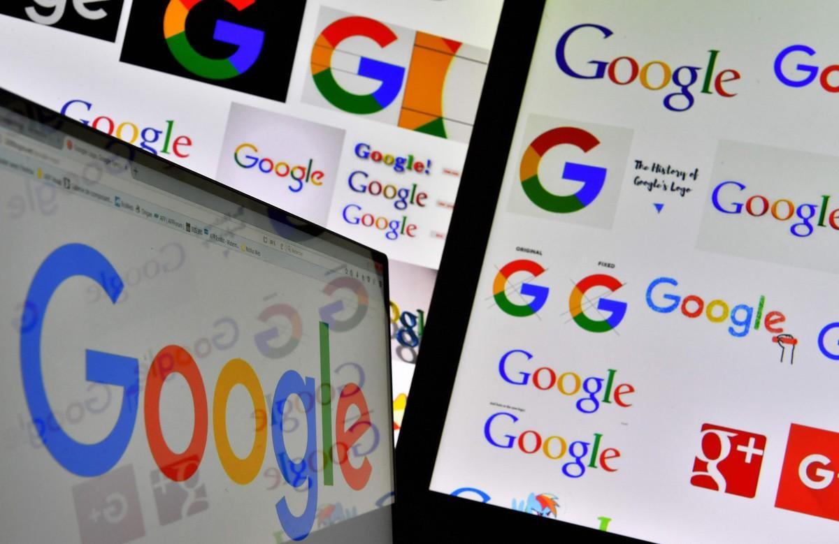 FILES  This file photo taken on November 20  2017 shows shows logos of US technology company Google displayed on computer screens  Google is accused of illegally collecting data belonging to more than five million UK iPhone users  in a mass legal action launched on November 30  2017  A campaign group dubbed  Google You Owe us  says the tech giant owes consumers  trust  fairness and money  after unlawfully placing cookies on mobile phones between 2011 and 2012     AFP PHOTO   LOIC VENANCE