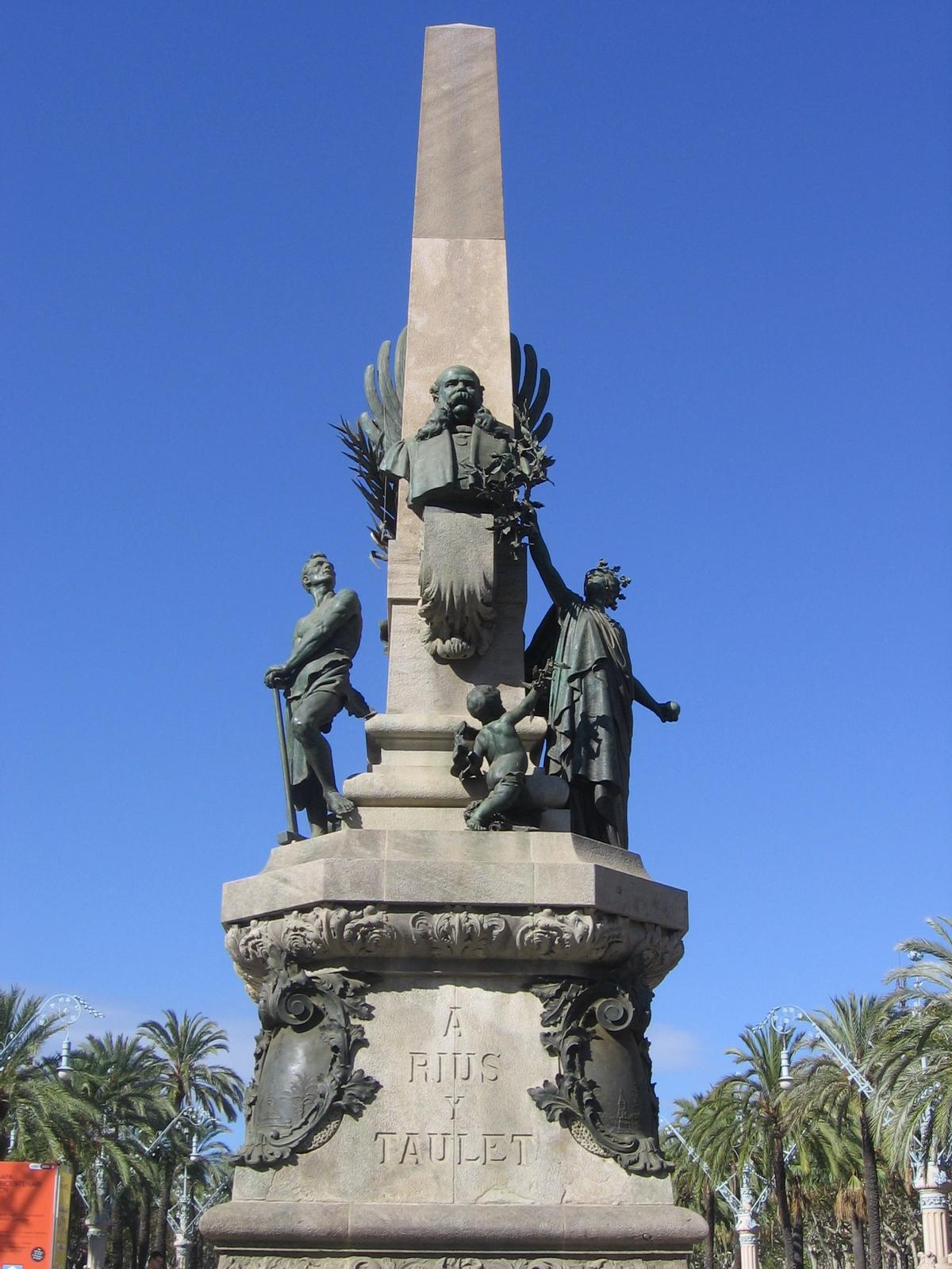 El monumento a Riu i Taulet, reciclado de un proyecto fallido anterior que iba a ser dedicado a Cerdà.