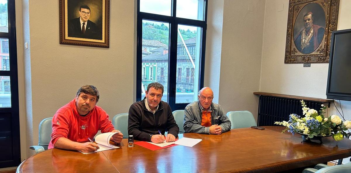 La firma del convenio.