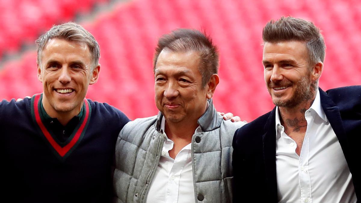 Phil Neville, Peter Lim y David Beckham, en una imagen de archivo.