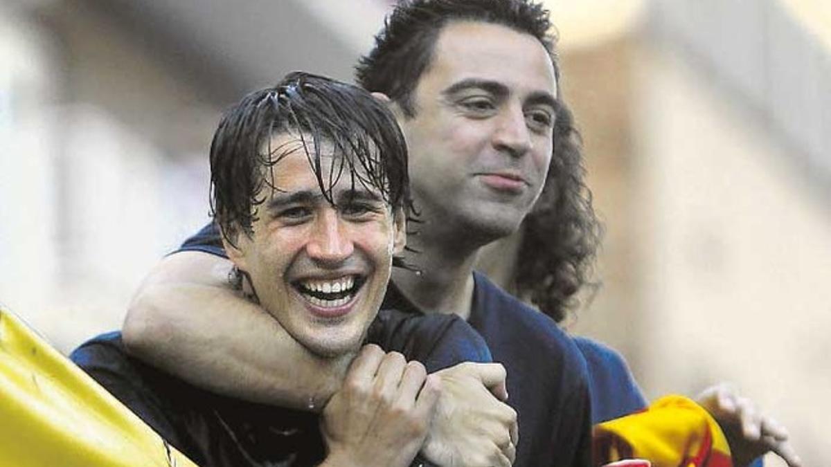 Bojan, junto a Xavi, durante su etapa como futbolista del Barça