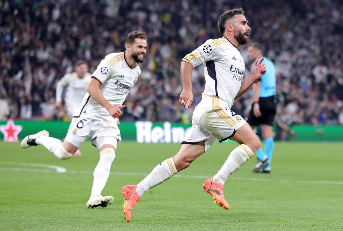 Dani Carvajal, jugador del Real Madrid, celebra su gol con Nacho.