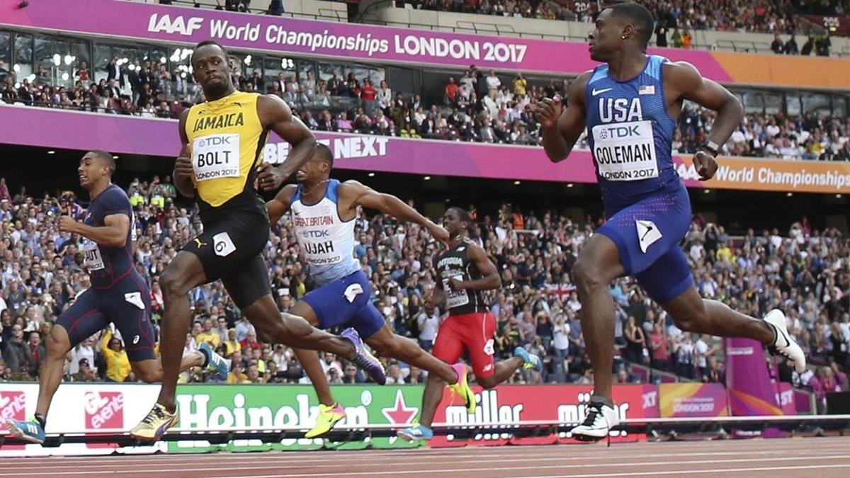 Coleman (derecha), junto a Bolt, en los Mundiales de Londres del 2017.