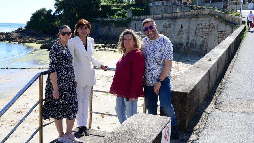 Representantes del ejecutivo local con la senadora Carme da Silva, ante el muro. | G.N.