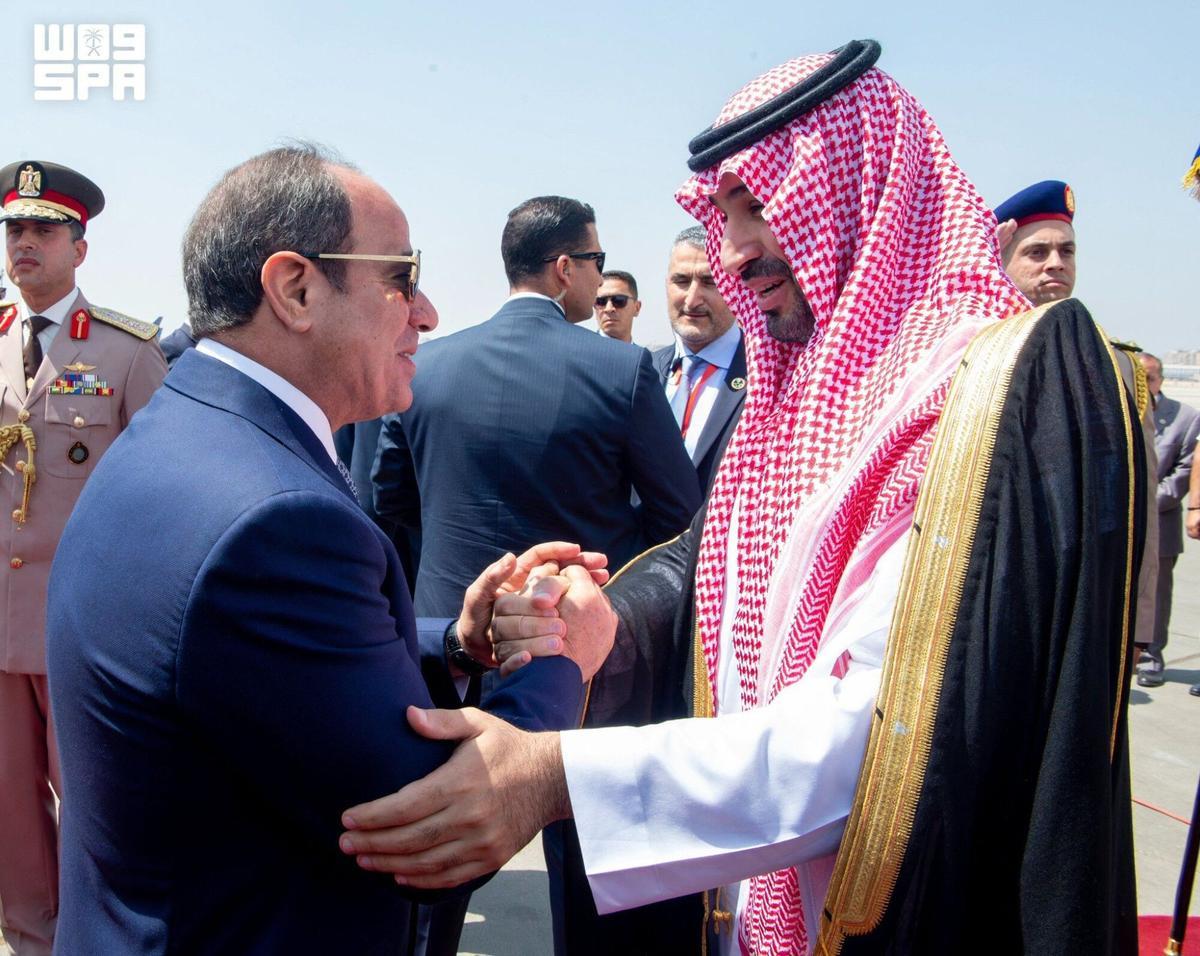 TOPSHOT - A handout picture provided by the Saudi Press Agency (SPA) on September 15, 2026, shows Egyptian President Abdel Fattah al-Sisi (L) shaking hands with Saudi de facto ruler Crown Prince Mohammed bin Salman during a welcoming ceremony at Cairo's International airport on September 15, 2026. Saudi Crown Prince Mohammed bin Salman arrived in Cairo on September 15, ahead of meetings with the Egyptian President Abdel Fattah al-Sisi, Egyptian state-linked media said, as the kingdom reels from strikes by Yemen's Houthis. (Photo by Ahmed NURELDINE / SPA / AFP) / === RESTRICTED TO EDITORIAL USE - MANDATORY CREDIT "AFP PHOTO / HO / SPA/ Ahmed NURELDINE" - NO MARKETING NO ADVERTISING CAMPAIGNS - DISTRIBUTED AS A SERVICE TO CLIENTS ===. === RESTRICTED TO EDITORIAL USE - MANDATORY CREDIT "AFP PHOTO / HO / SPA/ Ahmed NURELDINE" - NO MARKETING NO ADVERTISING CAMPAIGNS - DISTRIBUTED AS A SERVICE TO CLIENTS ===