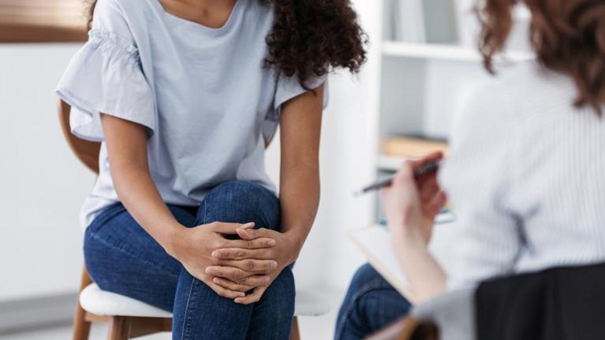 Anonymous photo of two women during group psychotherapy for people with depression