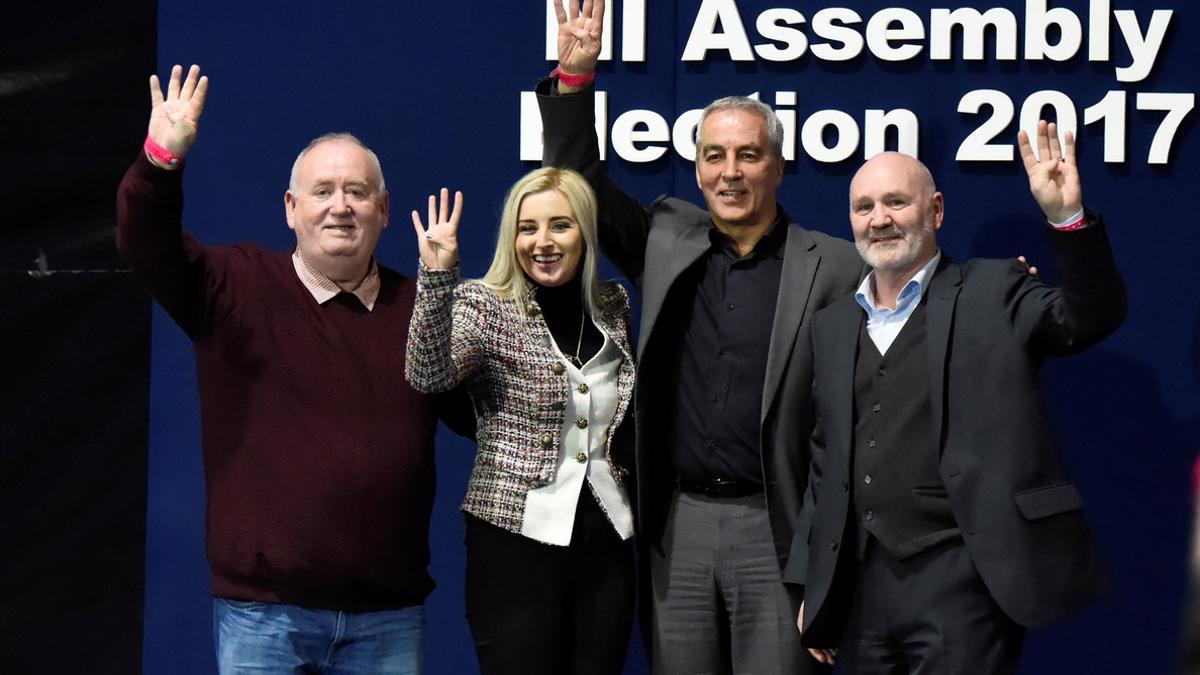 Sinn Fein elected candidates for East Belfast Fran McCann, Orlaithi Flynn, Pat Sheehan and Alex Maskey pose on stage at the count centre in Belfast