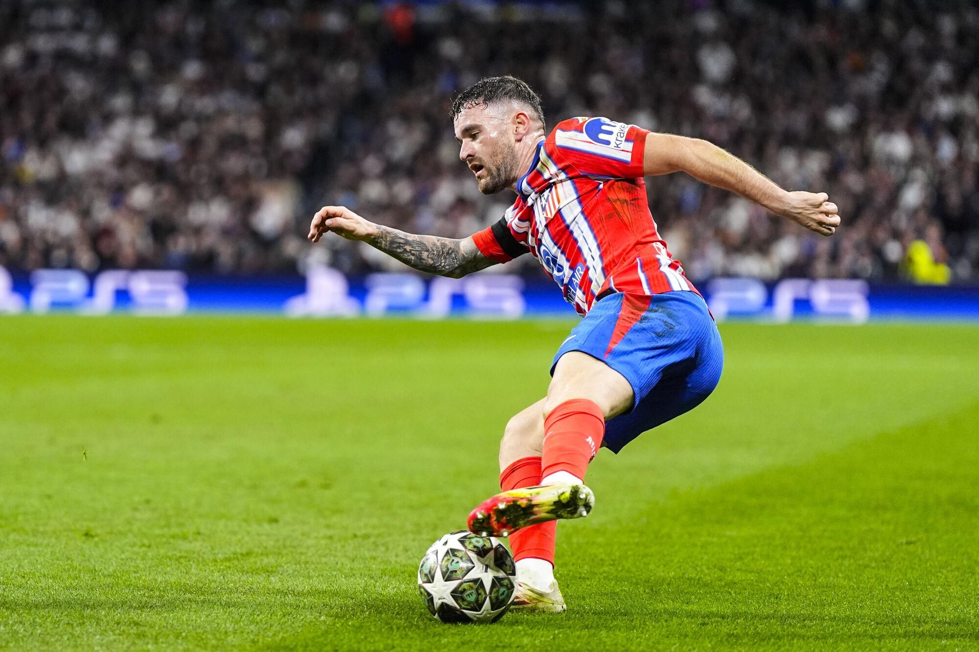 Javi Galan of Atletico de Madrid in action during the UEFA Champions League 2024/25  League Round of 16 First Leg match between Real Madrid CF and Atletico de Madrid, at Santiago Bernabeu stadium on March 04, 2025, in Madrid, Spain. AFP7 04/03/2025 ONLY FOR USE IN SPAIN. Oscar J. Barroso / AFP7 / Europa Press;2025;SPAIN;SPORT;ZSPORT;SOCCER;ZSOCCER;Real Madrid CF v Atletico de Madrid - UEFA Champions League 2024/25  League Round of 16 First Leg;
