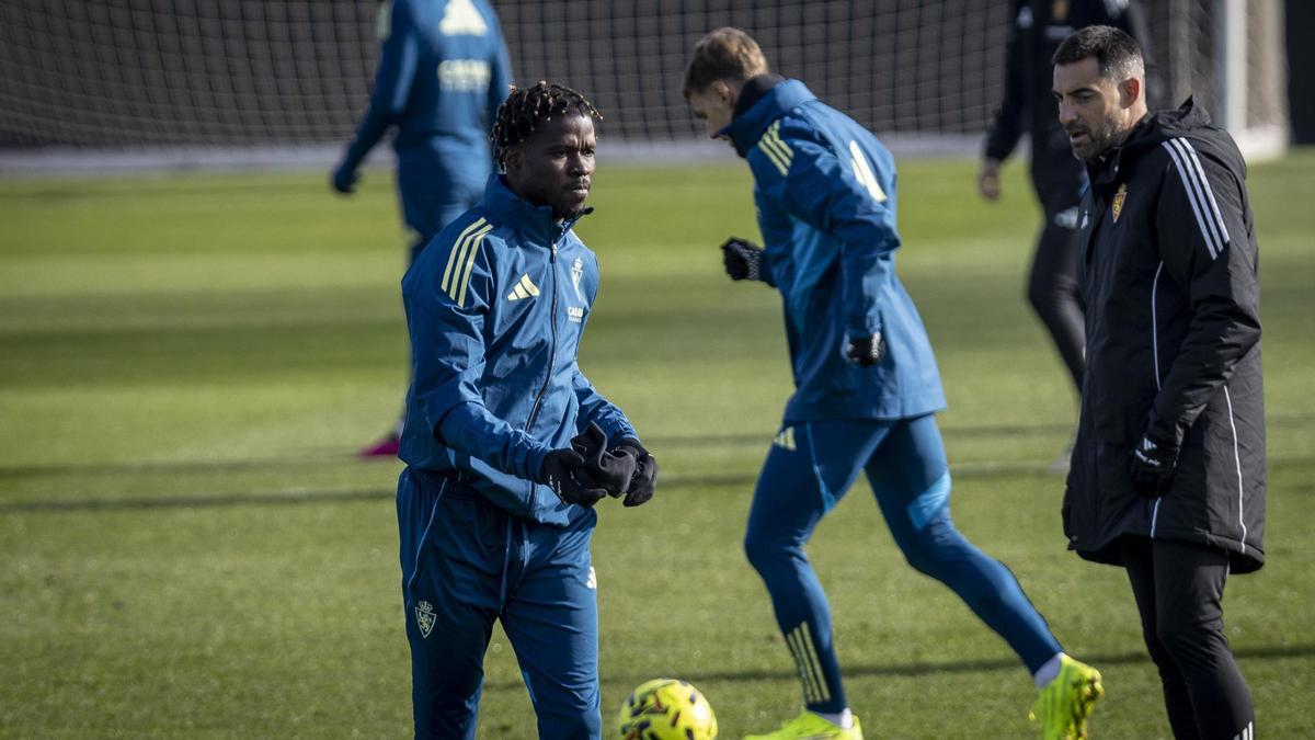 Paul Akouokou, junto a Rubén Sellés en una sesión.