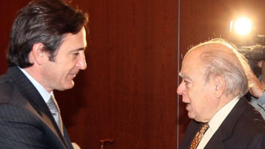 Jordi Pujol y su hijo Josep Pujol Ferrusola en el Hotel Majestic en 2009.