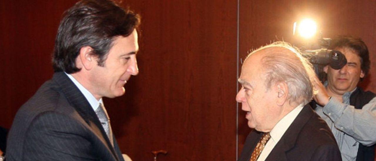 Jordi Pujol y su hijo Josep Pujol Ferrusola en el Hotel Majestic en 2009.