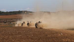 Israeli troops patrolling along the Israel-Gaza border