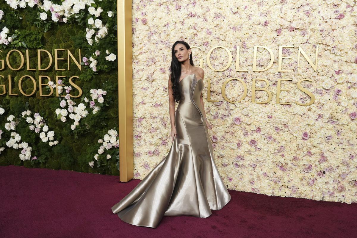 Demi Moore arrives at the 82nd Golden Globes on Sunday, Jan. 5, 2025, at the Beverly Hilton in Beverly Hills, Calif. (Photo by Jordan Strauss/Invision/AP). 010525131219, 21334631