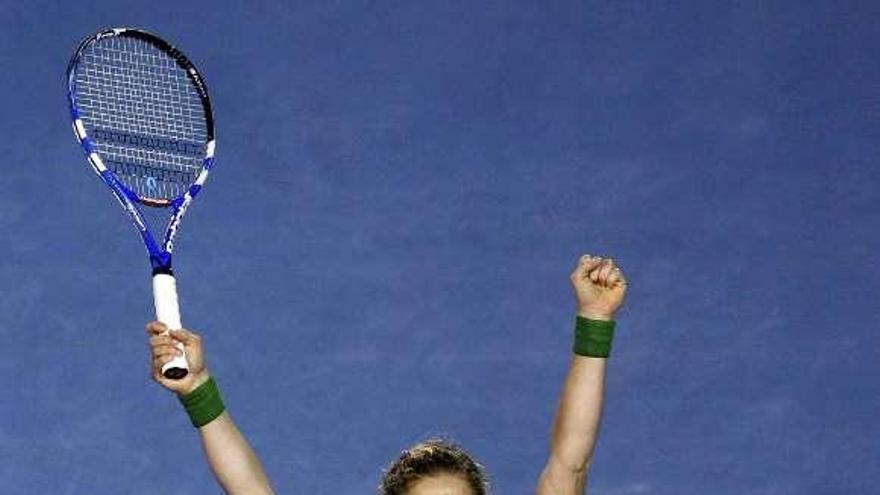 Kim Clijsters celebra su triunfo, ayer en Australia. / mick tsikas