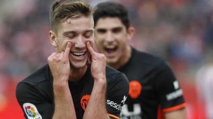 Vietto celebra el gol con Guedes, ayer en Montilivi.