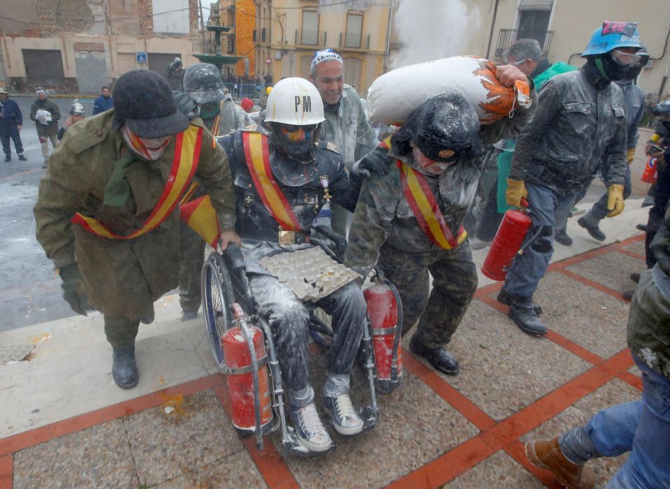 Revellers battle with flour and eggs during the ...