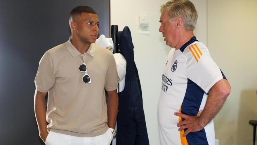 Mbappé y Ancelotti, en Valdebebas.