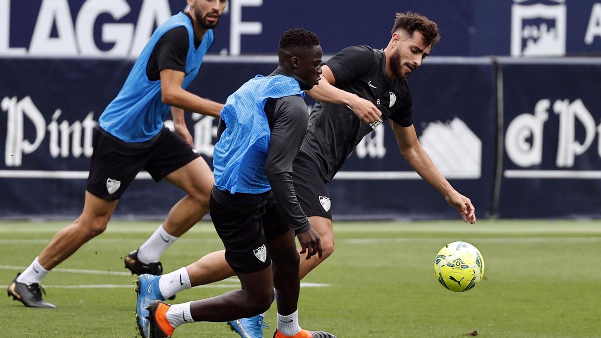 Los blanquiazules, entrenando hoy en Martiricos