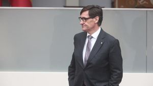 El presidente de la Generalitat, Salvador Illa durante el acto solemne de homenaje a la bandera nacional y desfile militar por el 12 de octubre en Madrid