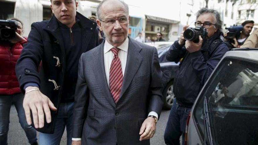 Rodrigo Rato, tras su detención en su casa de Madrid.