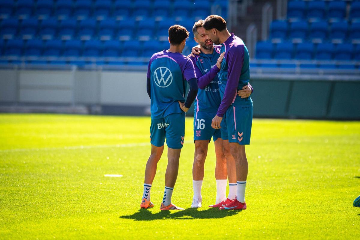 David Rodríguez, Aitor Sanz y Enric Gallego, en el entrenamiento del jueves.