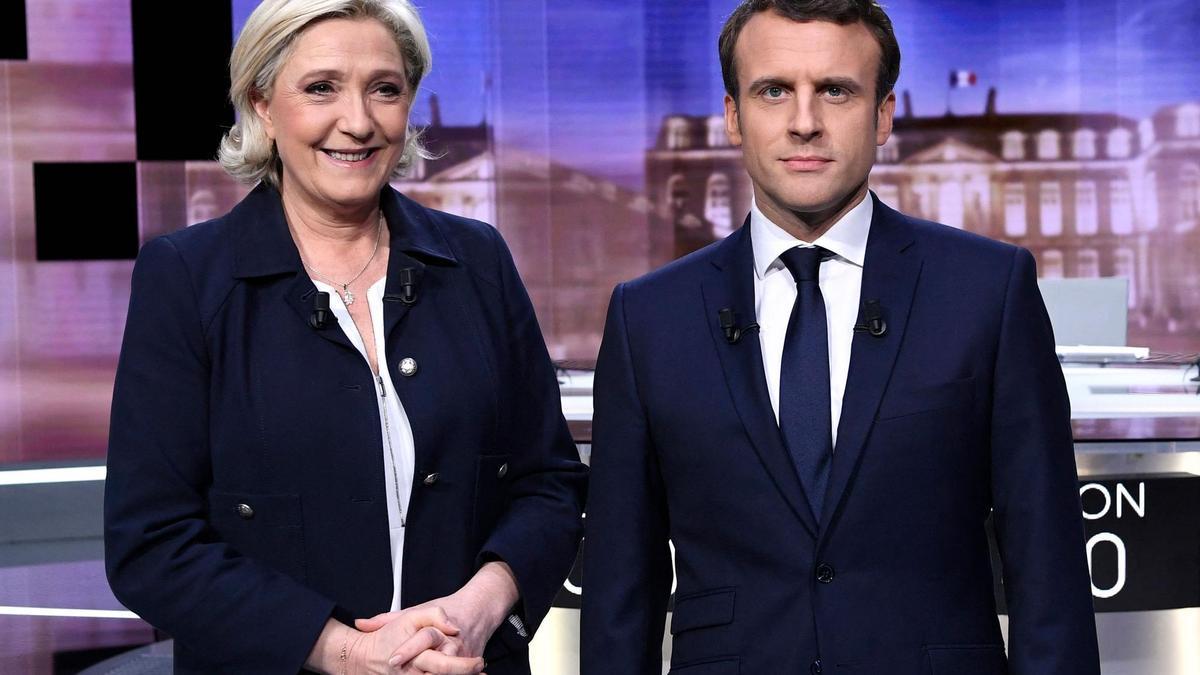 Marine Le Pen y Emmanuel Macron, durante el debate que protagonizaron en la anterior campaña electoral, el 3 de mayo de 2017.