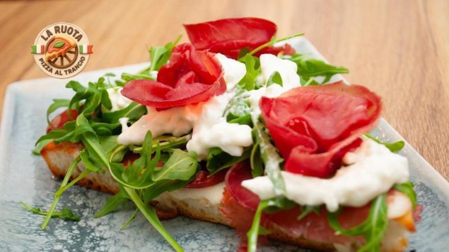 La Ruota introduce en la ciudad la pizza al trancio, concepto de pizza al corte al estilo de Milán