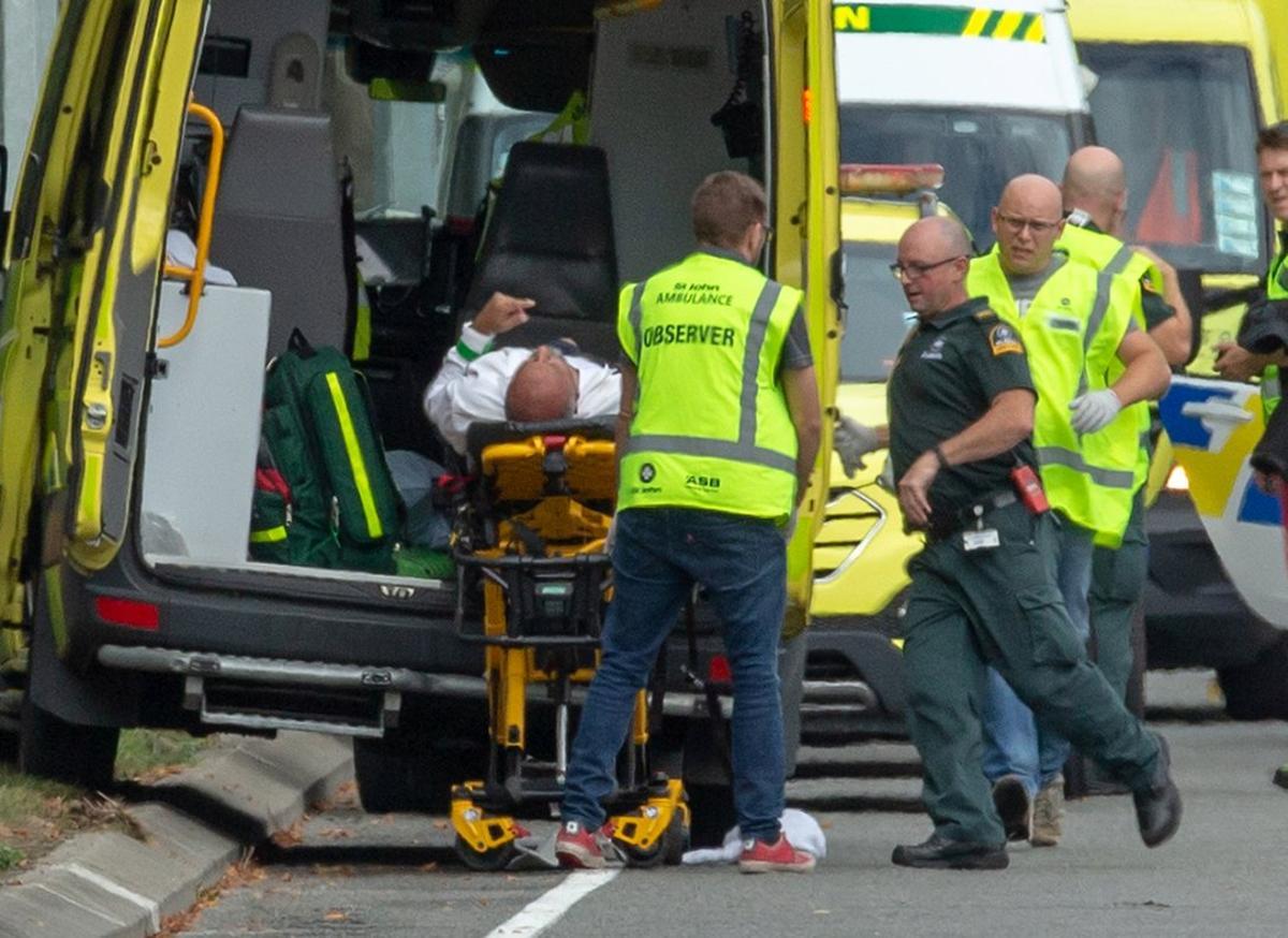 An injured person is loaded into an ambulance following a shooting at the Al Noor mosque in Christchurch, New Zealand, March 15, 2019. REUTERS/SNPA/Martin Hunter  ATTENTION EDITORS - NO RESALES. NO ARCHIVES     TPX IMAGES OF THE DAY