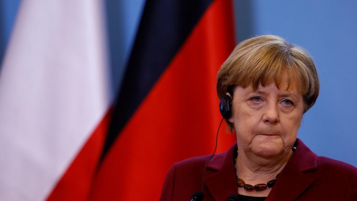 FILE PHOTO:  German Chancellor Angela Merkel attends a press conference in Warsaw