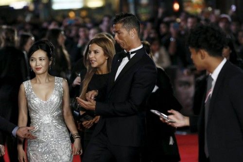 Soccer player Ronaldo gestures on the red carpet at the world premiere of "Ronaldo" at Leicester Square in London
