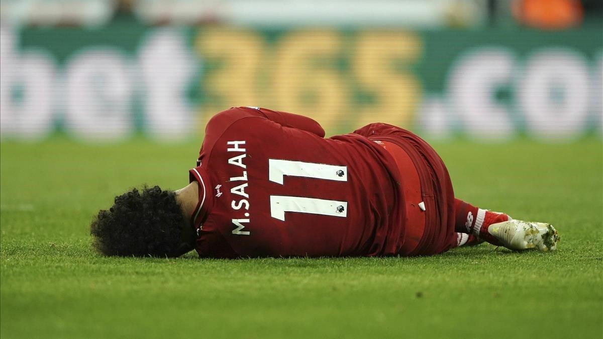 aguasch48014729 liverpool s mohamed salah lies injured during a premier leag190506113115