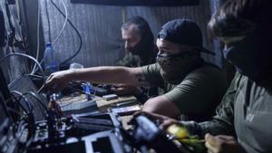 FILE- Ukrainian soldiers of 3rd assault brigade fly by an FPV exploding drone over Russian positions in Kharkiv region, Ukraine, on Aug. 24, 2024. (AP Photo/Evgeniy Maloletka, File). EDITORIAL USE ONLY / ONLY ITALY AND SPAIN