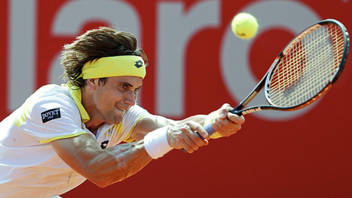 David Ferrer devuelve la bola a Stanislas Wawrinka