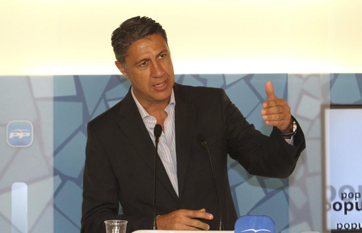 El candidat del PPC, Xavier García Albiol, durant la roda de premsa, aquest dissabte, a Barcelona. El candidat del PPC, Xavier García Albiol, durant la roda de premsa, aquest dissabte, a Barcelona.