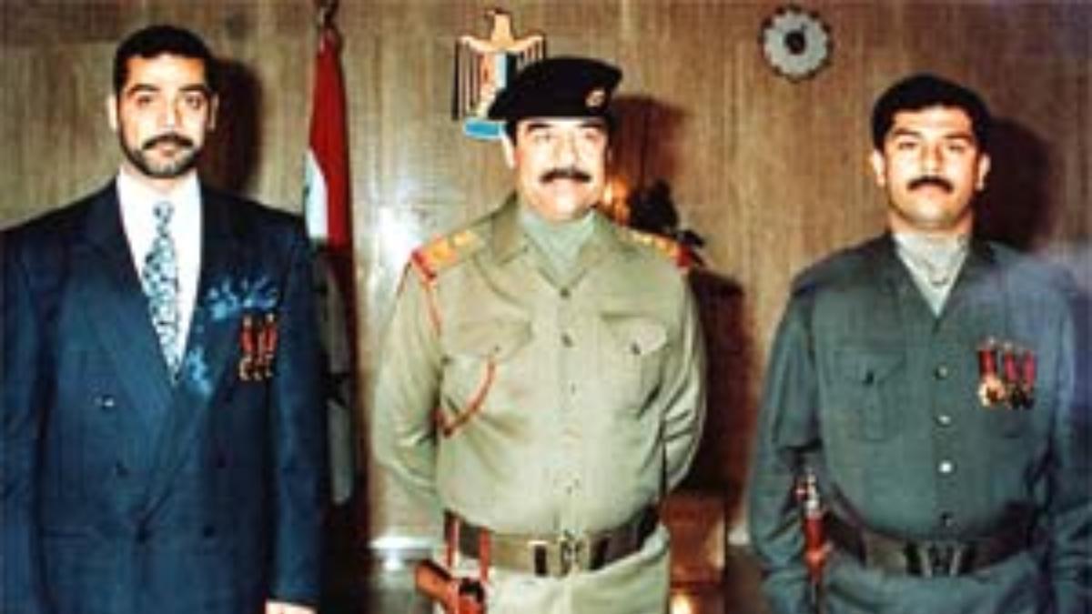 Saddam Hussein y sus dos hijos