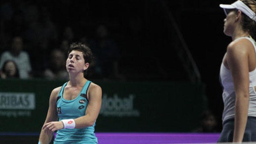 Suárez y Muguruza se lamentan de un punto perdido.