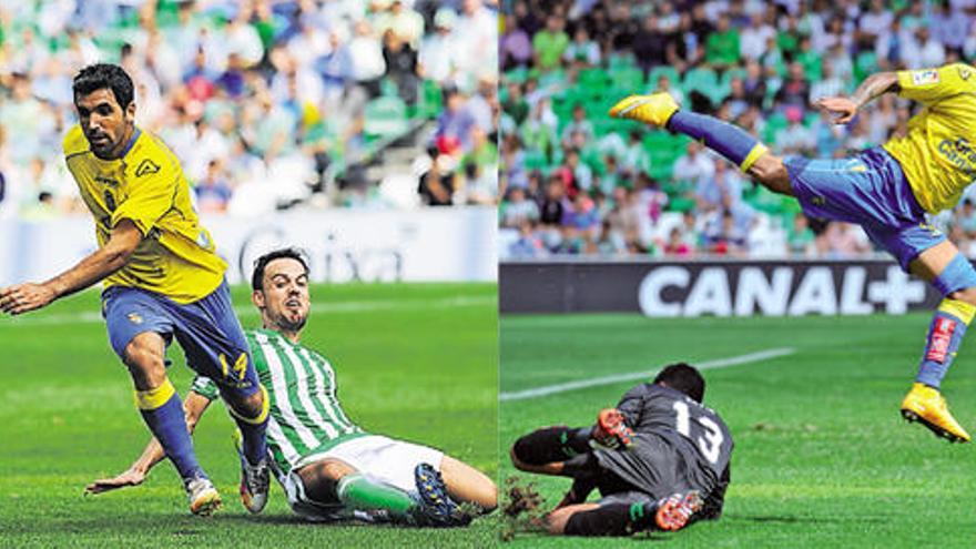 Vicente Gómez controla el esférico, ayer, en el Villamarín, ante la presión del chileno del Betis Lolo Reyes.