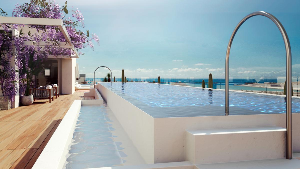 Piscina comunitaria en la cubierta del edificio de la promoción Ayanz de AEDAS Homes en el nuevo barrio de Benalúa Sur en Alicante.