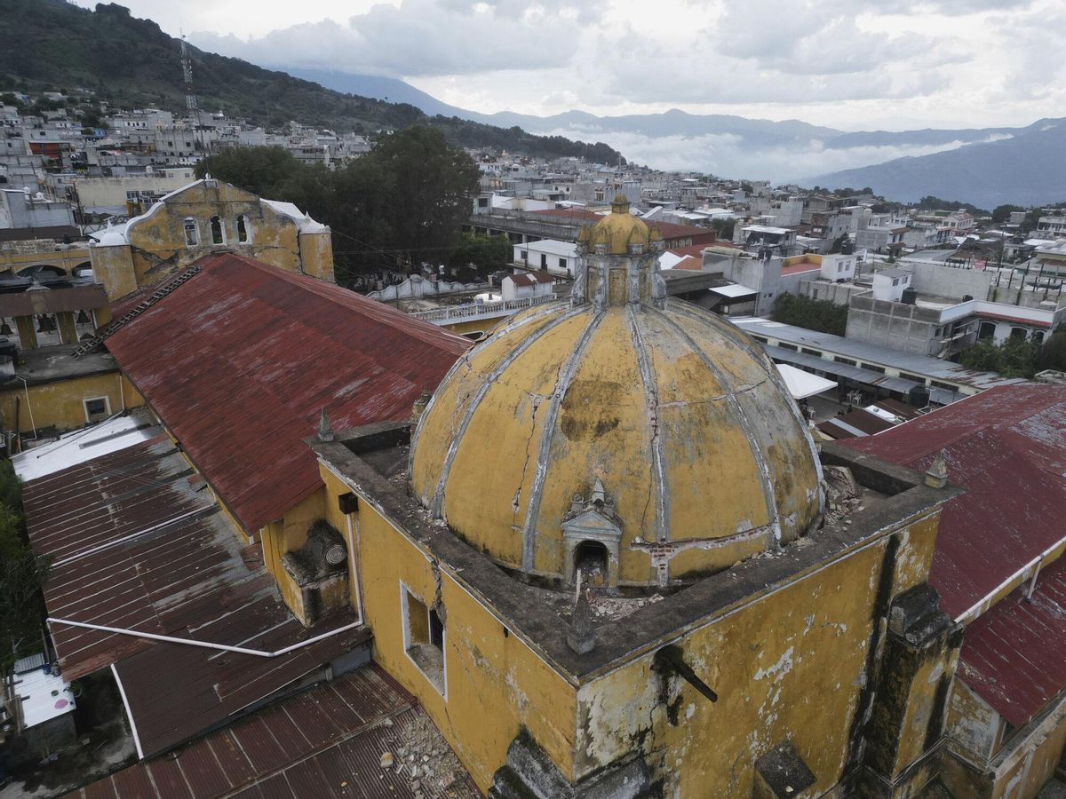 The dome of a Catholic church stands cracked in Santa Maria de Jesus, Guatemala, Wednesday, July 9, 2025, following dozens of earthquakes and aftershocks. (AP Photo/Moises Castillo). EDITORIAL USE ONLY/ONLY ITALY AND SPAIN